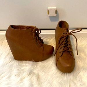 Brown faux leather wedge booties